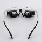Magnifying glass with LED lighting and adjustable lenses