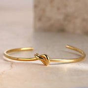 Allure | Twisted Knot Golden Bangle