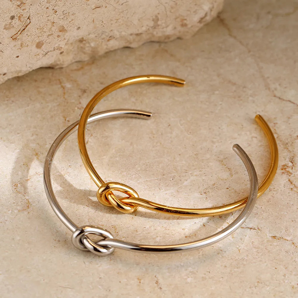Allure | Twisted Knot Golden Bangle