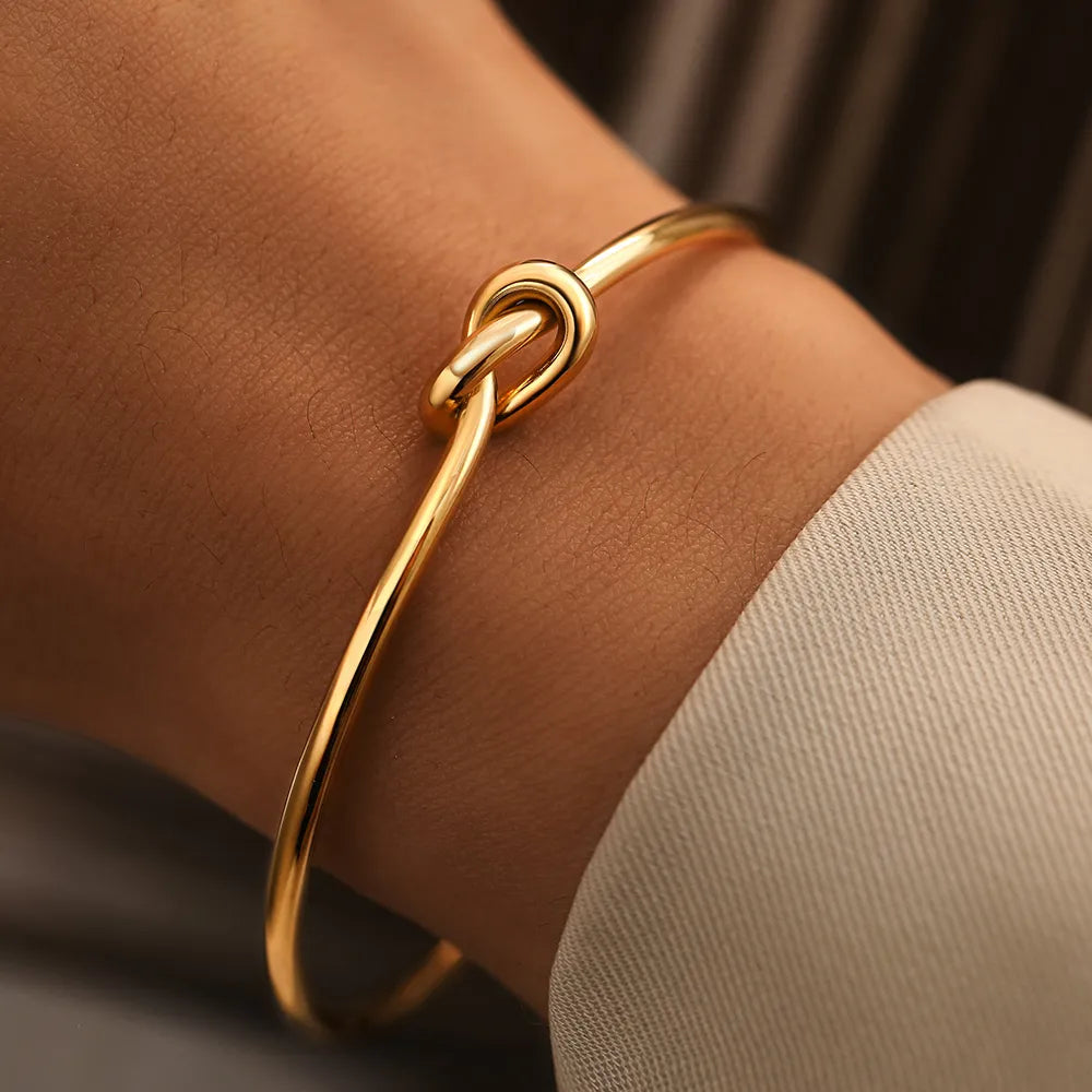 Allure | Twisted Knot Golden Bangle