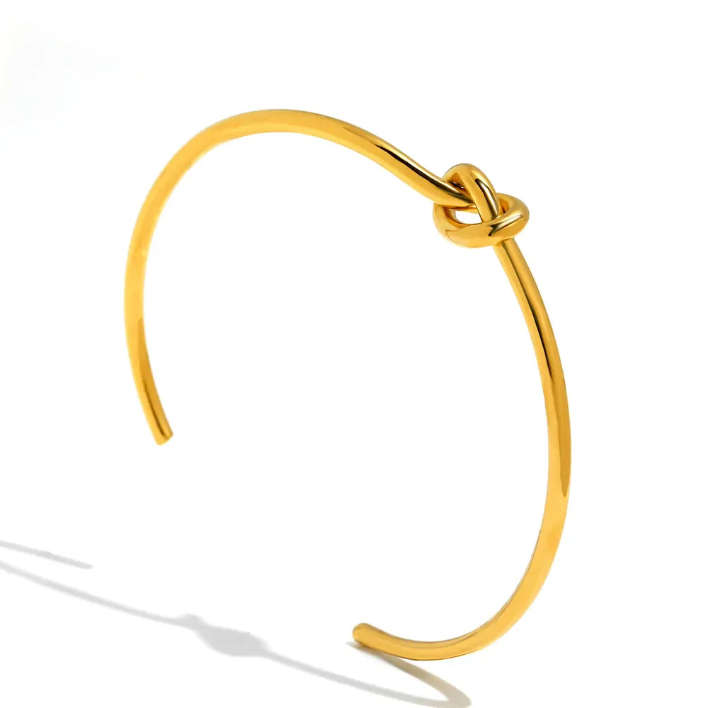 Allure | Twisted Knot Golden Bangle