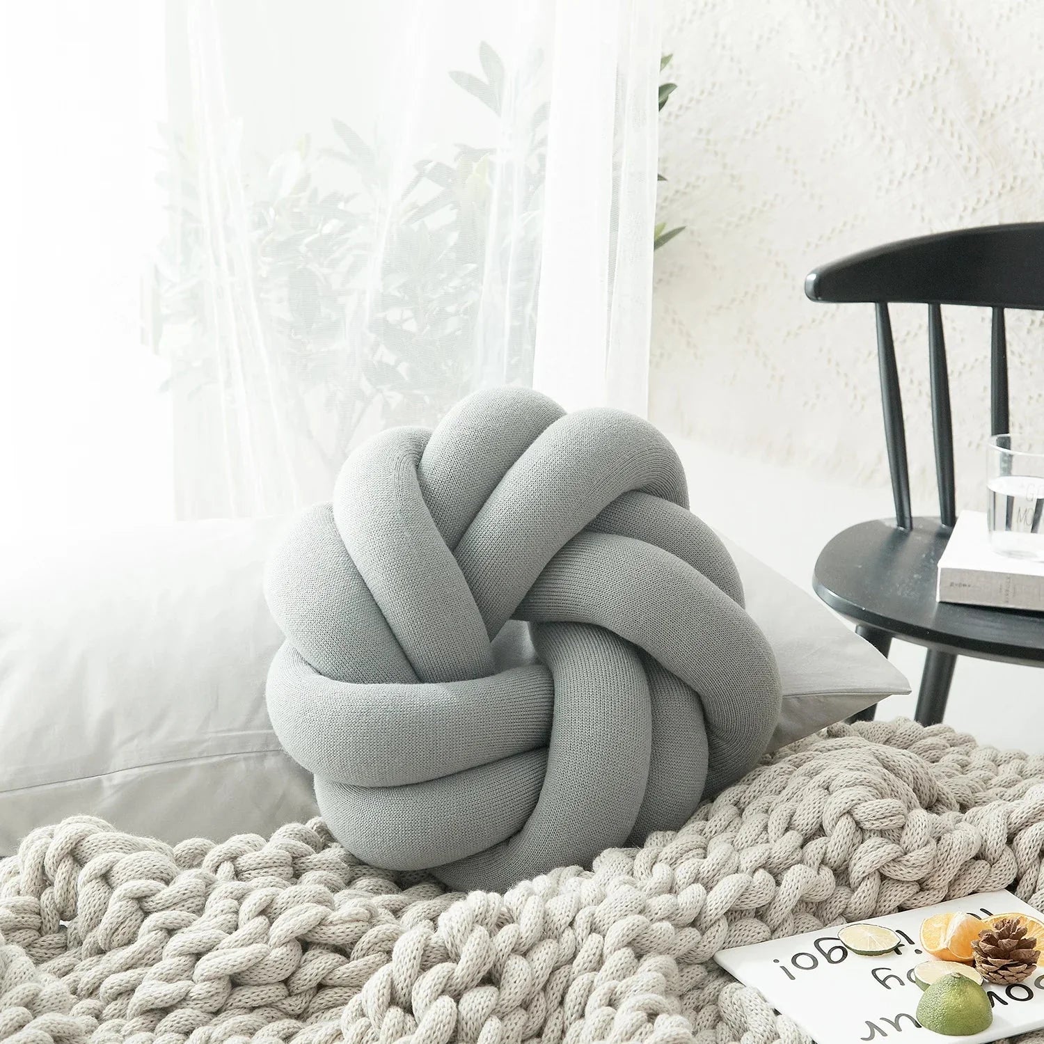 Modern knotball pillow