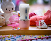 Smart baby bottle with temperature designation and ergonomic design
